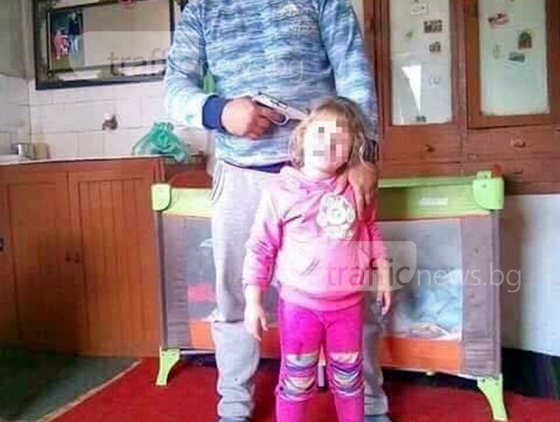 Баща опря пистолет в главата на дъщеричката си, похвали се във Фейсбук СНИМКА
