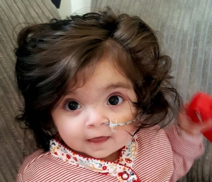 Това 8-месечно бебе има повече коса от всеки друг, когото познавате СНИМКА