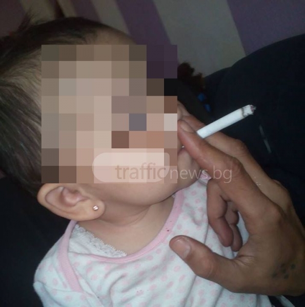 Ром взриви социалните мрежи – сложи запалена цигара в устата на бебето си СНИМКИ