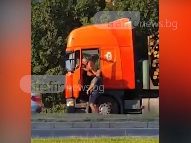 Скандал на пътя: Батка с БМВ разби огледалото на камион, посяга на шофьора ВИДЕО