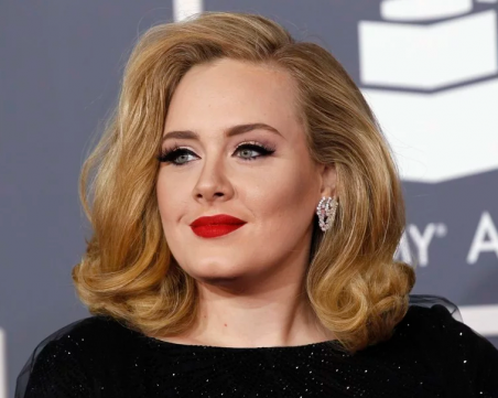 Адел се раздели с мъжа си, поделят си грижите за сина им