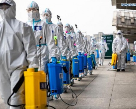 Година след първия случай на корона в Ухан, Китай иска да преразгледа произхода на COVID-19