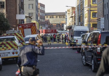 Най малко 52 ма души са загинали при пожар в пететажна сграда